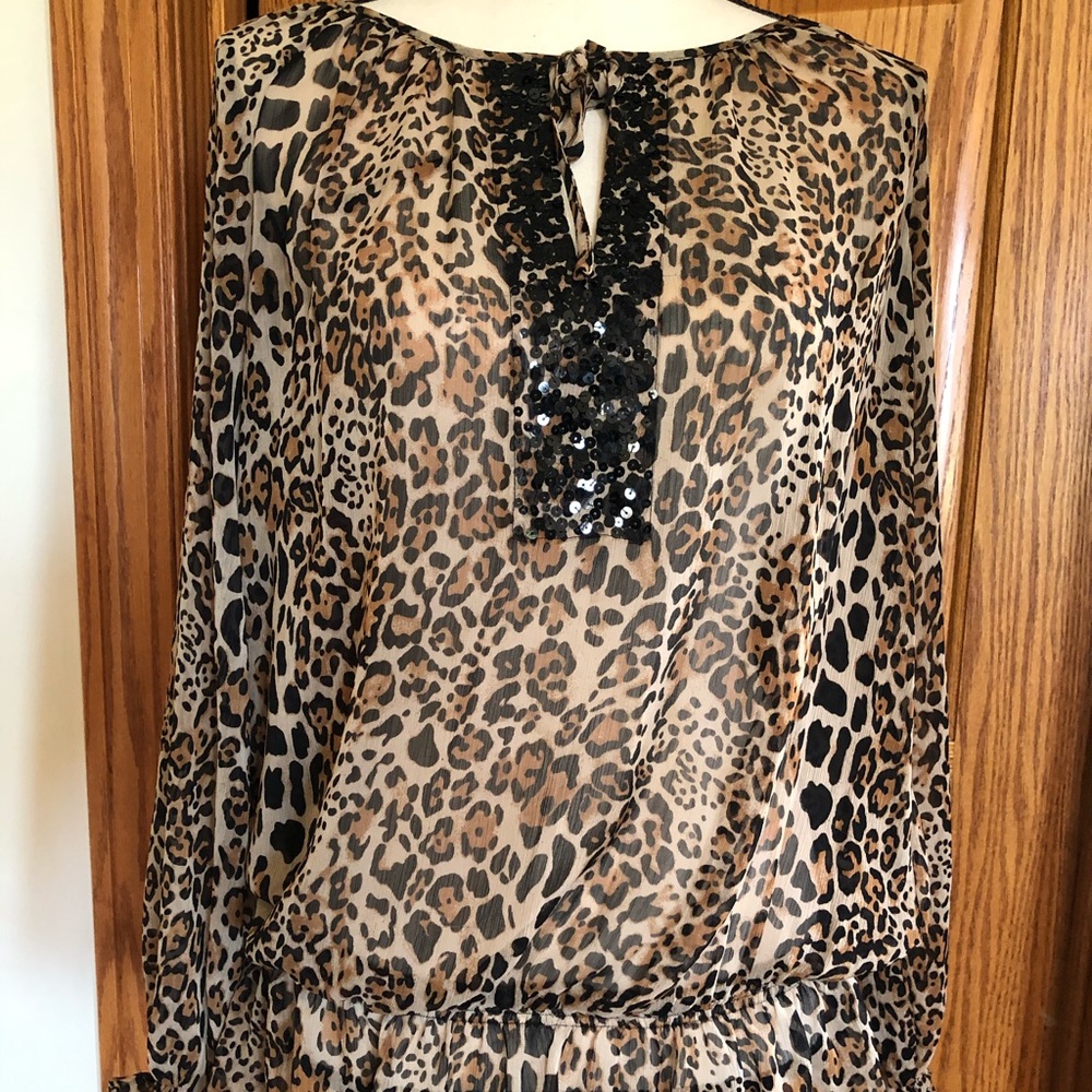 Animal print blouse.
